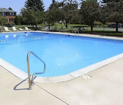 Sparkling swimming pool at Waverlywood Apartments & Townhomes in Webster, New York