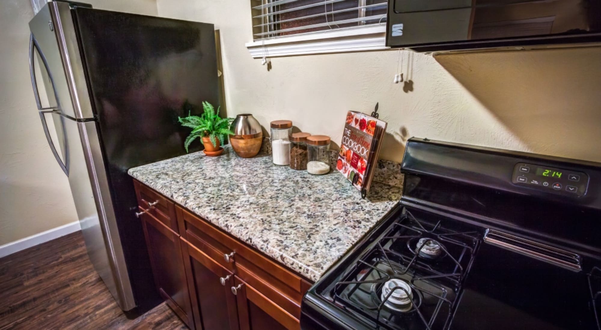 Kitchen with modern appliances at The Shavelson in Houston, Texas