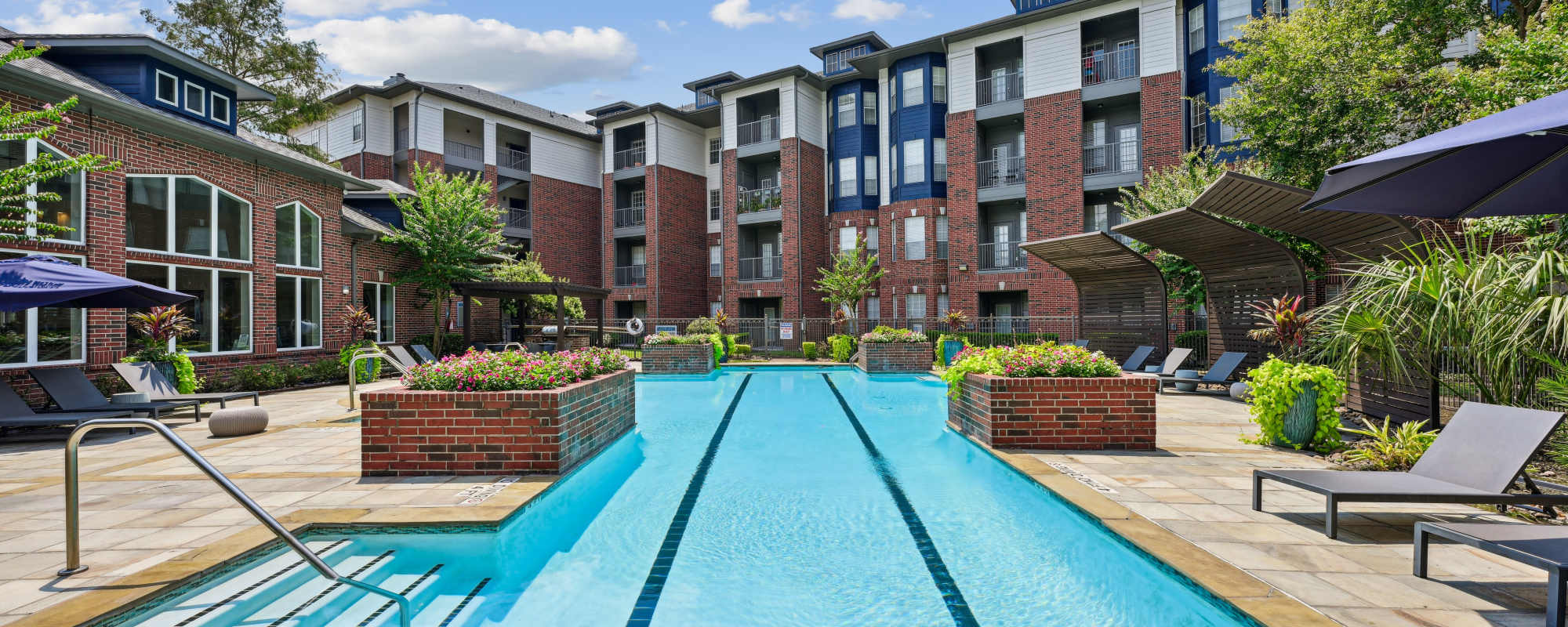 Community view with swimming pool at Lakeside in Houston, Texas 