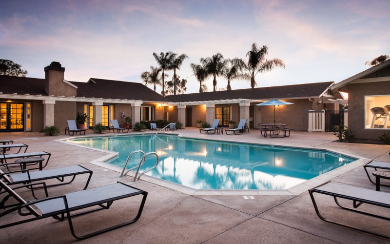 The beautiful swimming pool at sunset at Lakeview Village Apartments in Spring Valley, California