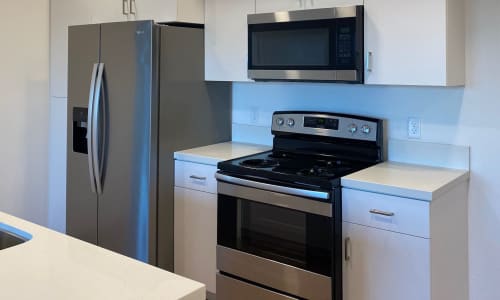 Kitchen with stainless-steel appliances at Eight Mile House in Stockton, California