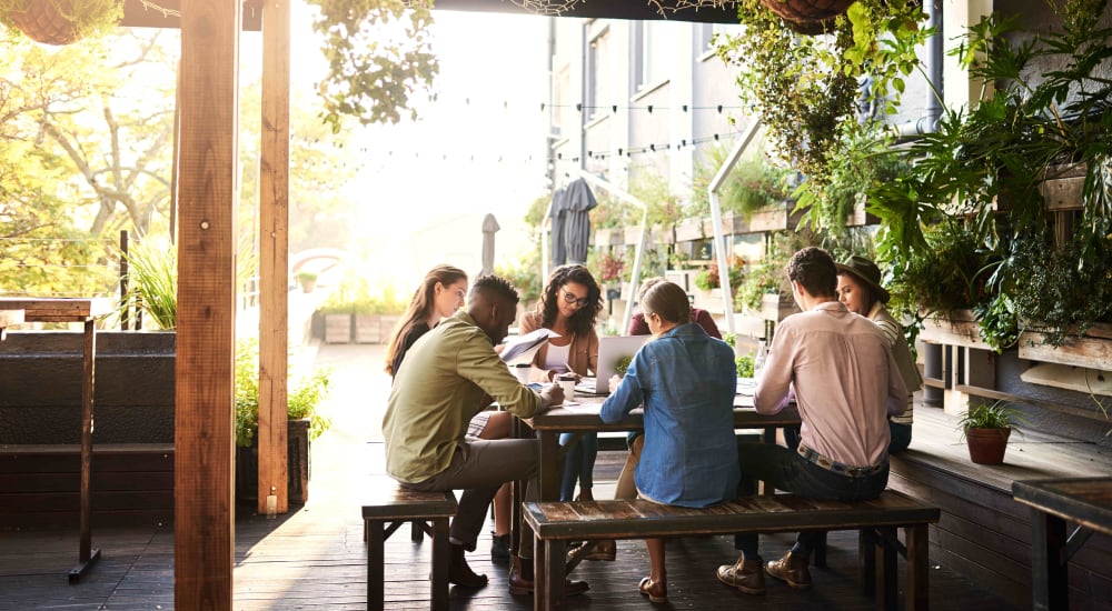 Residents sit down to study near Analog Tacoma in Tacoma, Washington