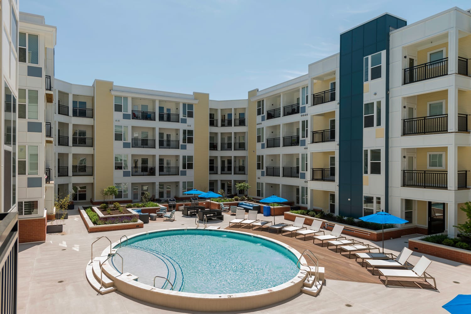 Swimming pool and lounge chairs at Element at Ghent in Norfolk, Virginia