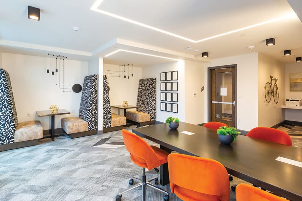 Meeting areas with semi-private booth seating in the co-working space at ArLo Apartments in Portland, Oregon