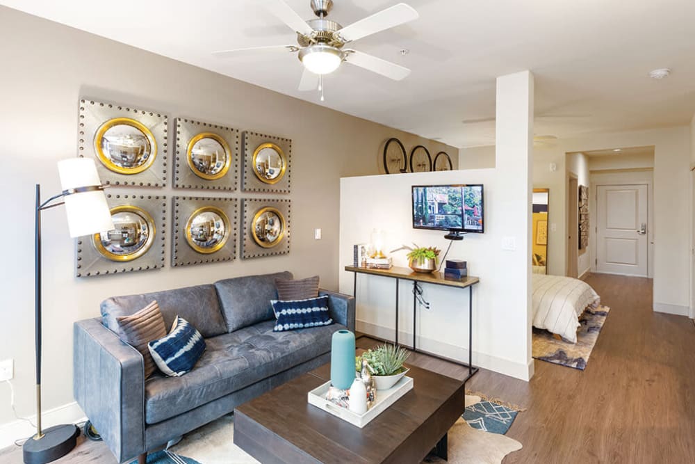 Ceiling fan and wood-style flooring in a model apartment at ArLo Apartments in Portland, Oregon