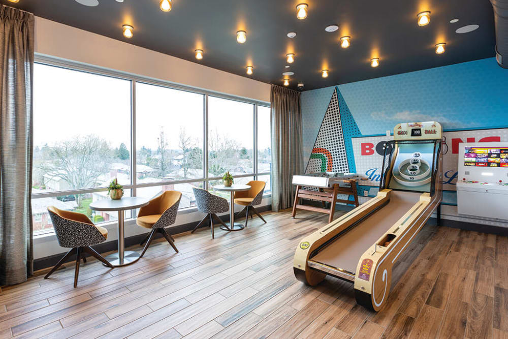 Skee-ball and more games to choose from in the arcade lounge at ArLo Apartments in Portland, Oregon