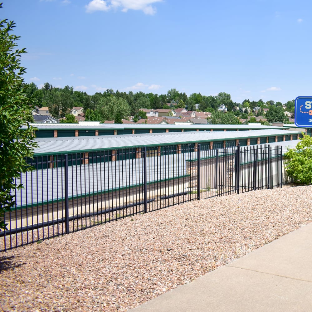 The secure front gate at STOR-N-LOCK Self Storage in Littleton, Colorado