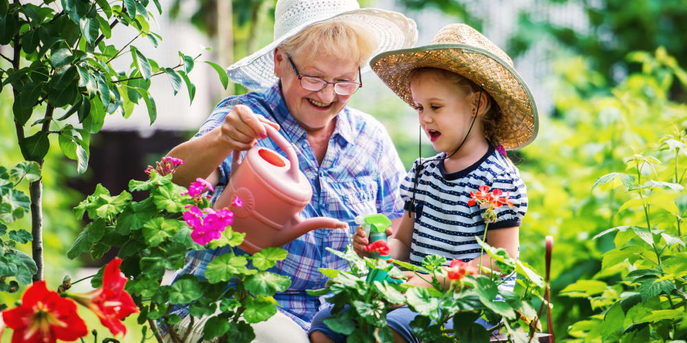 Grandmother and grandson gardening at The Springs at Lancaster Village in Salem, Oregon
