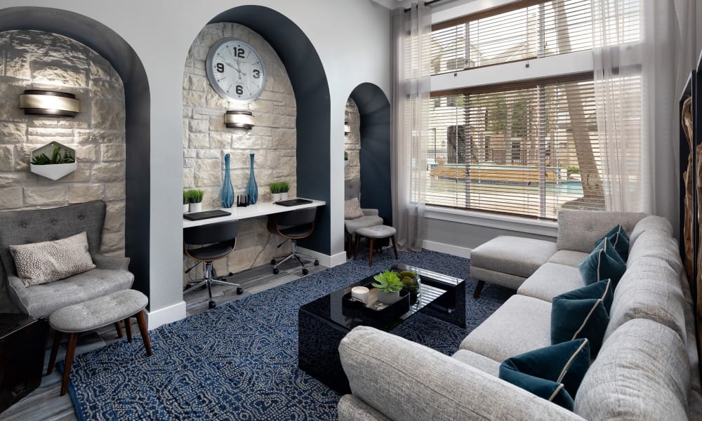 View of the resident clubhouse lounge area from the lobby entrance at The Retreat at Cinco Ranch in Katy, Texas
