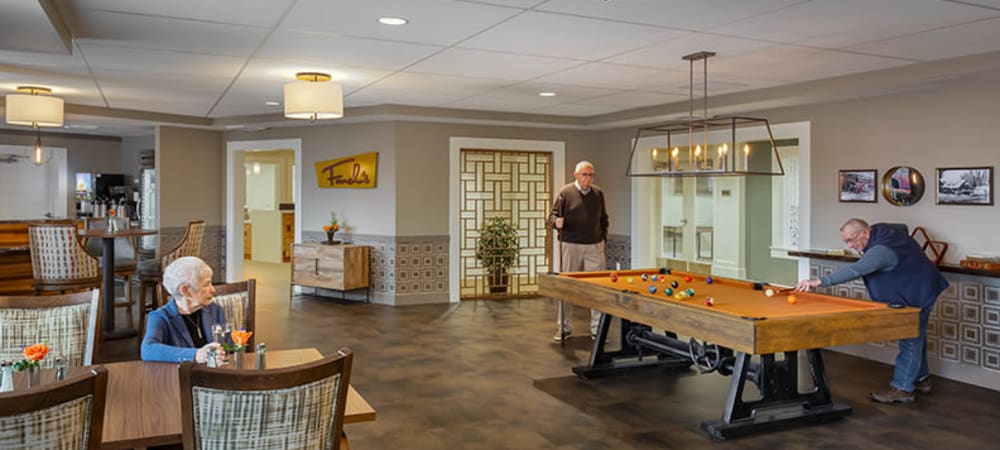 Large game room complete with pool table in upscale senior living facility at The Springs at Sherwood in Sherwood, Oregon