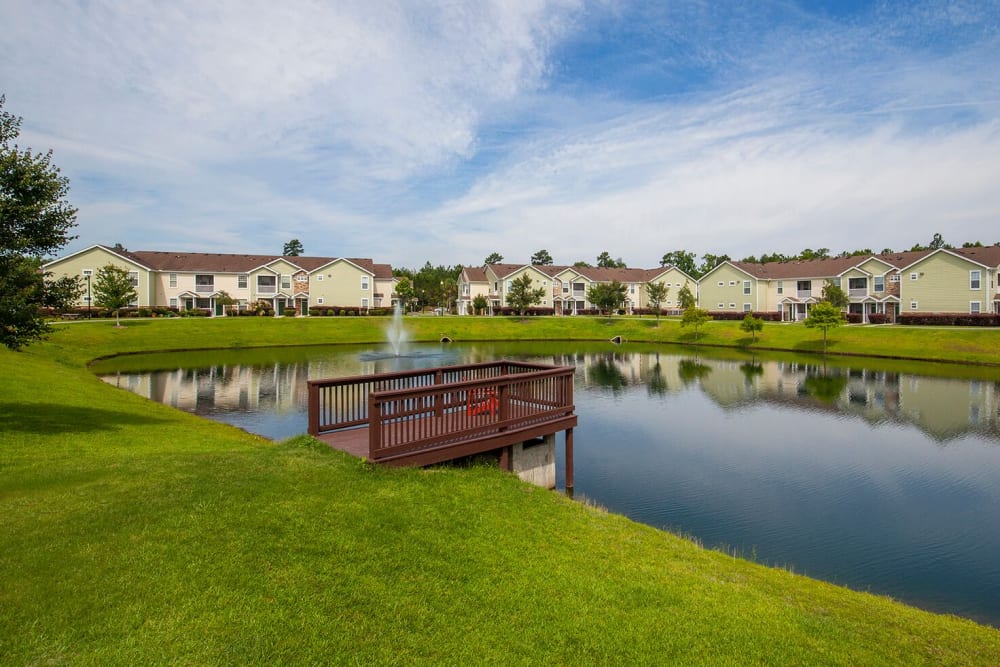 Serene pond at Panther Effingham Parc Apartments in Rincon, Georgia