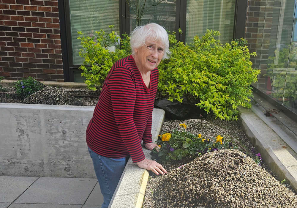Resident in the patio at Merrill Gardens at Wright Park in Tacoma, Washington