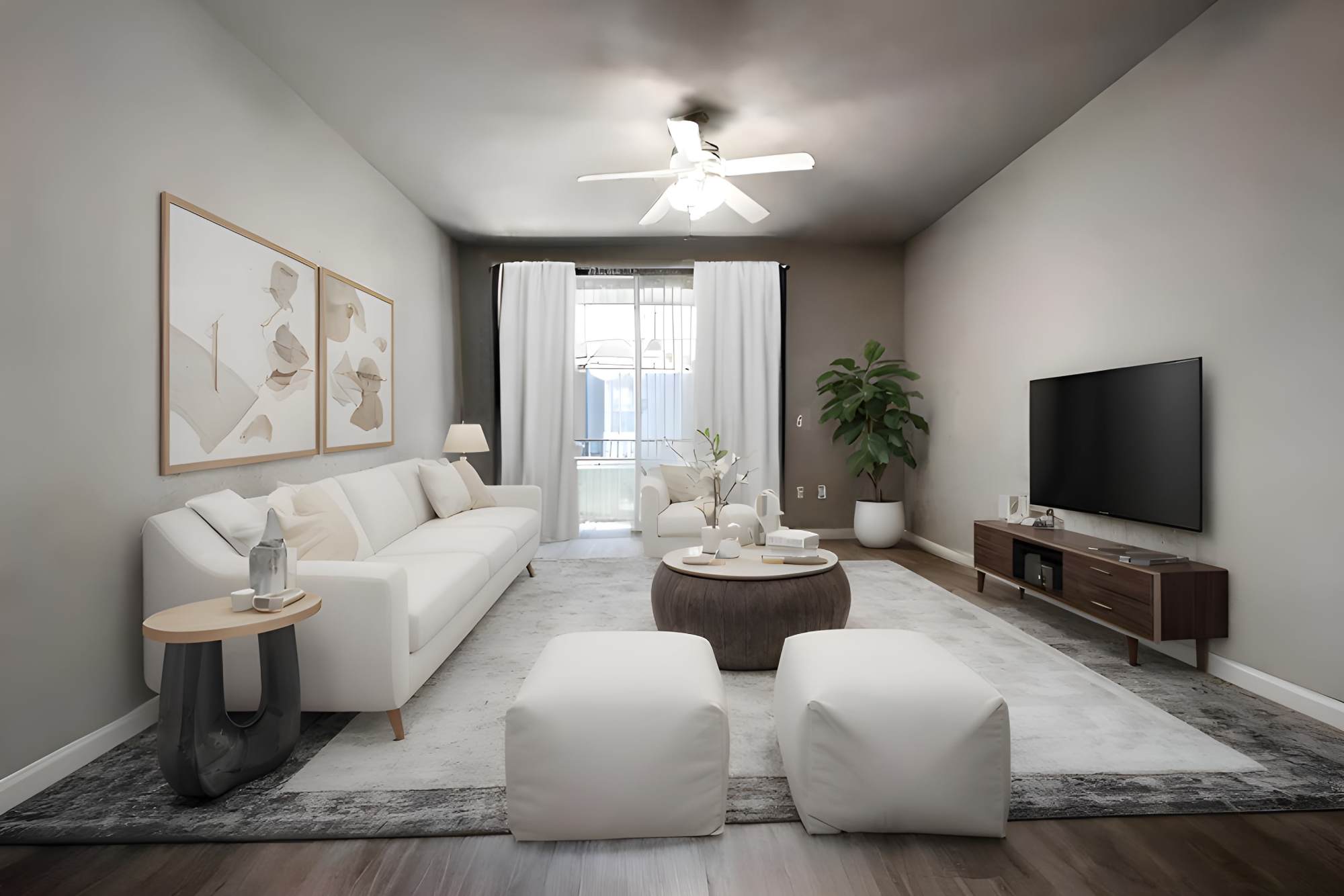 Living room with access to private patio at The Lofts in Sacramento, California
