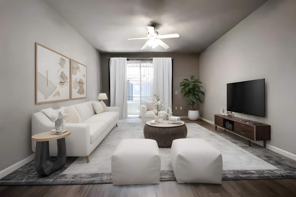 Living room with access to private patio at The Lofts in Sacramento, California