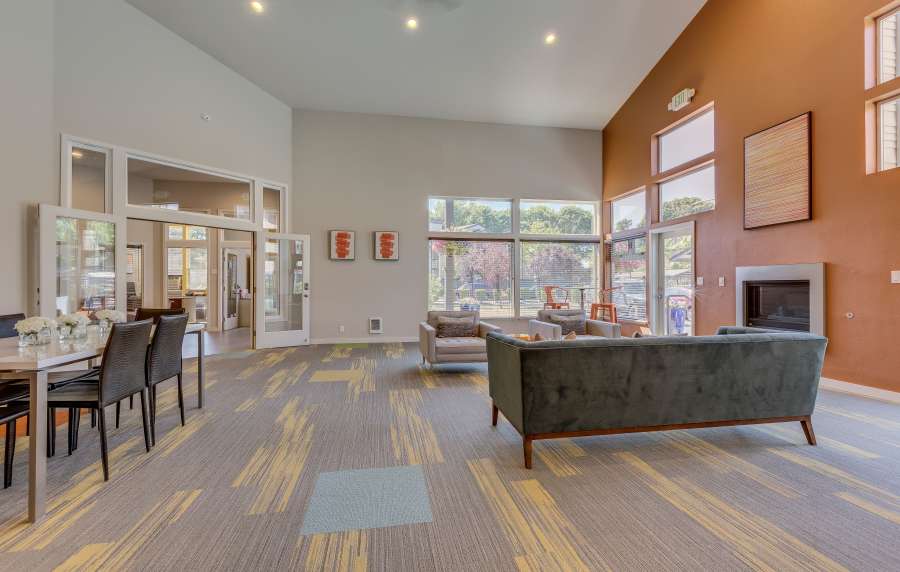 Indoor lounge with couch at Foundry on Fifth in Renton, Washington