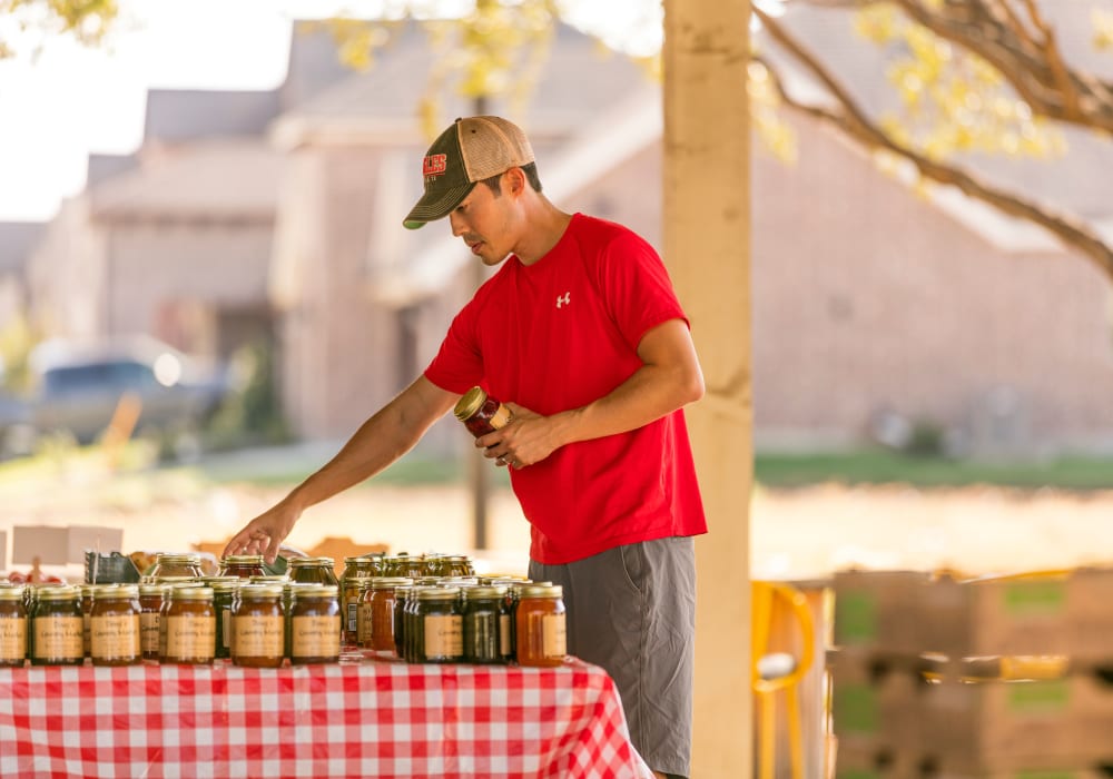 Purchasing some fresh food from the local market near BB Living Harvest in Argyle, Texas