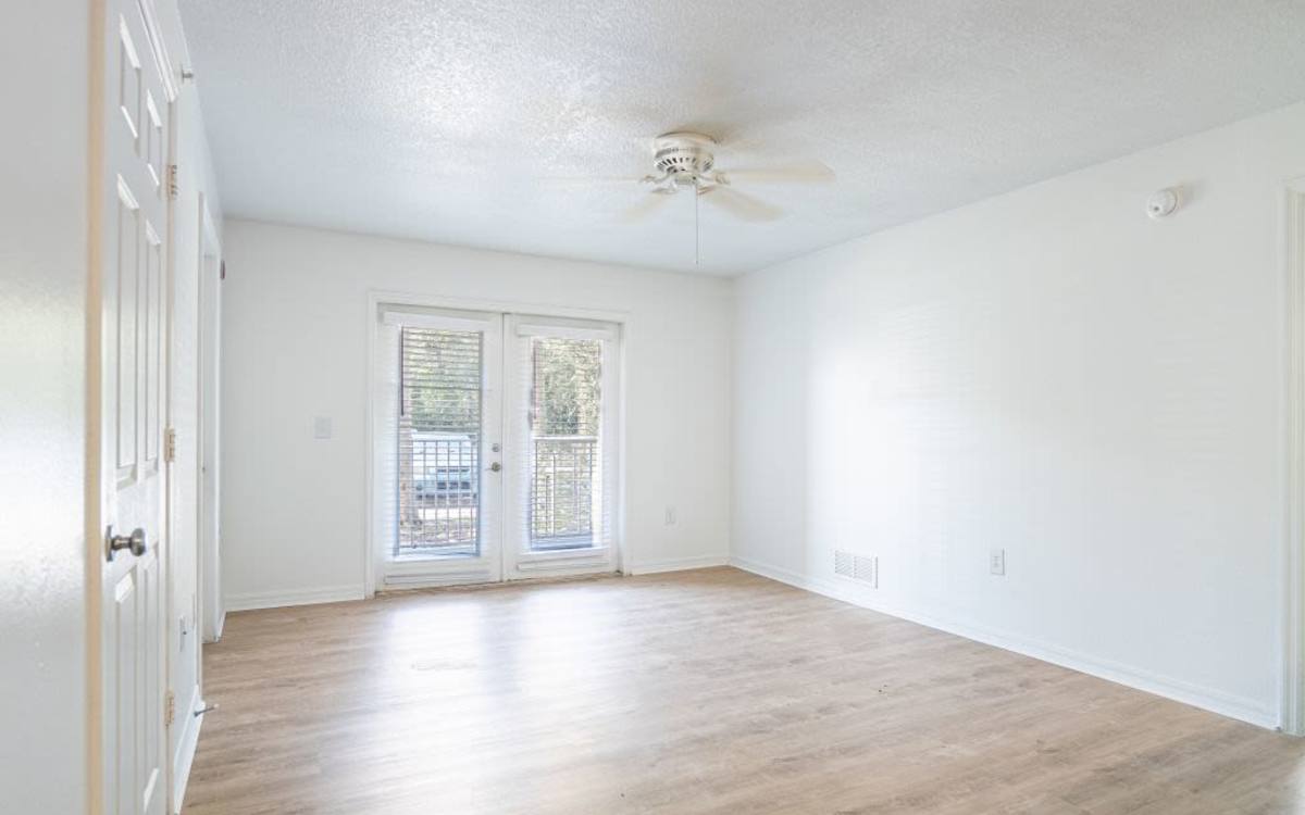 Unfurnished living room with wooden flooring Cypress Oaks in Leesburg, Florida
