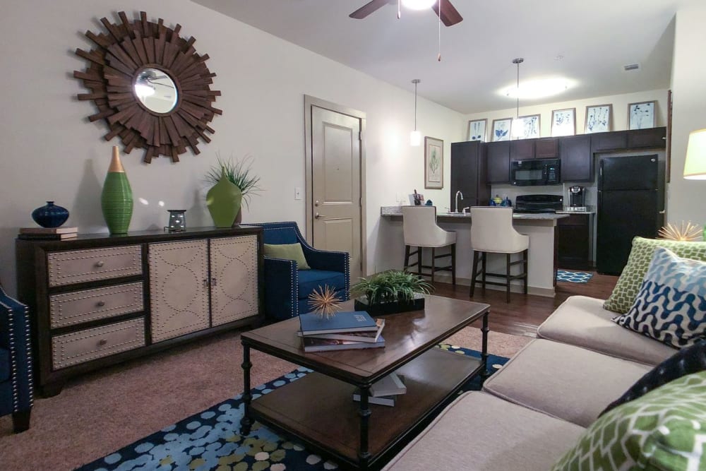Open concept model living room and kitchen at Anatole on MacArthur in Oklahoma City, Oklahoma
