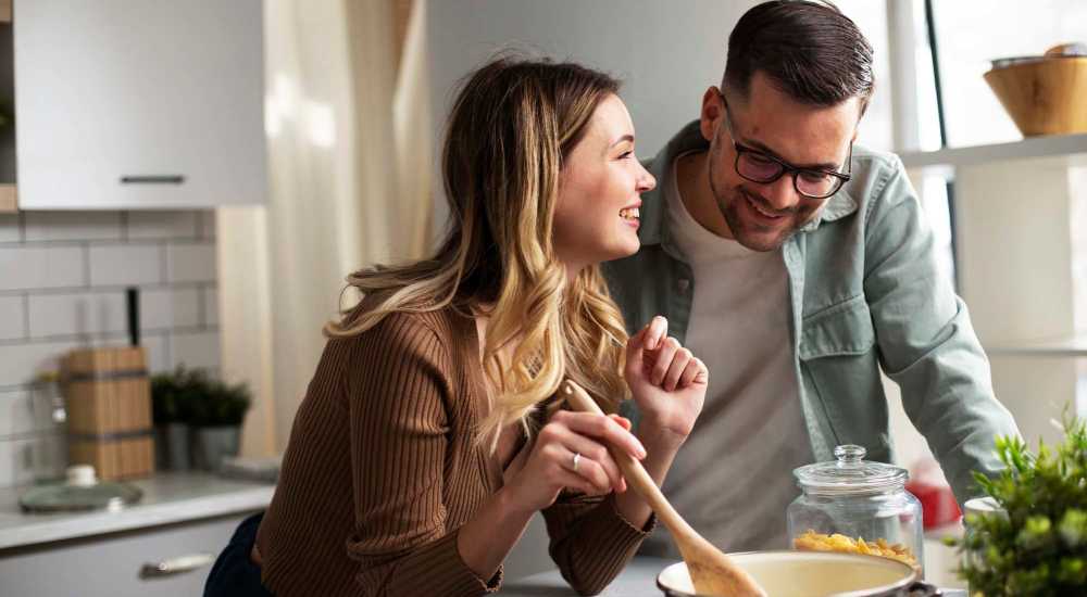 Residents cooking in their fully equipped kitchen at River Oaks in Vicksburg, Mississippi