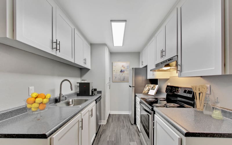 Spacious Kitchen room with hardwood-style floors at Avery Park Apartments in Fairfield, California