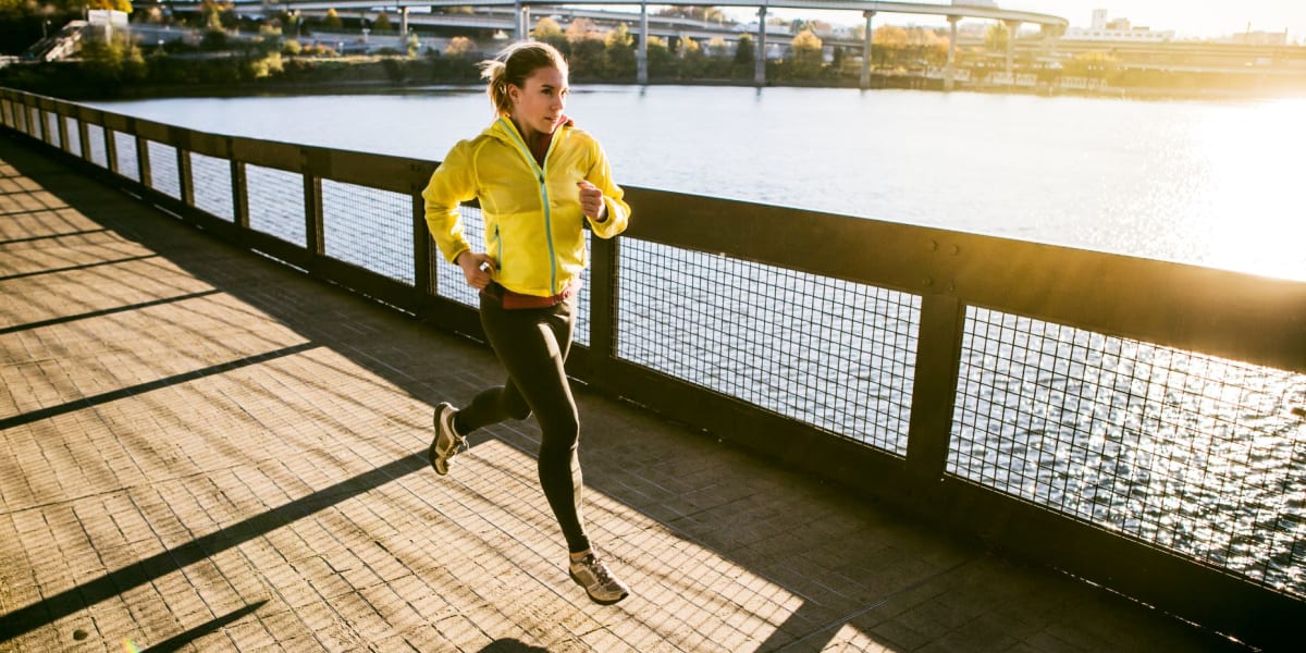 Resident running next to the water near MOD Apartments in Seattle, Washington