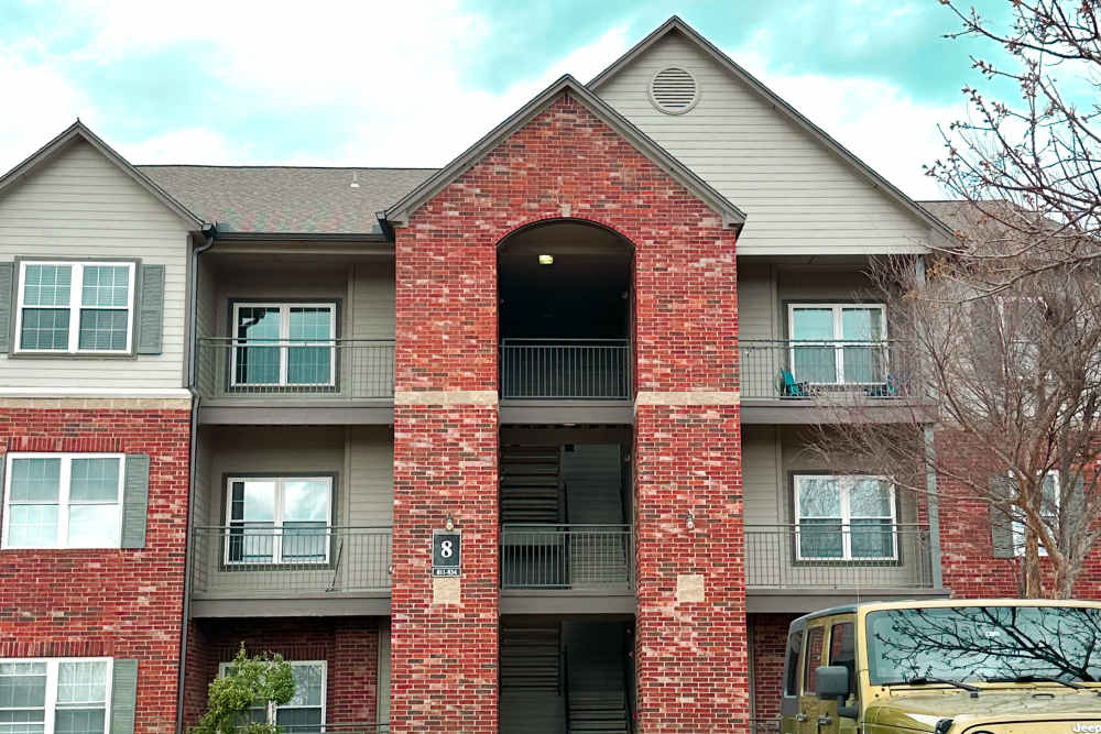 Resident playing with her dog at Highland Pointe in Yukon, Oklahoma
