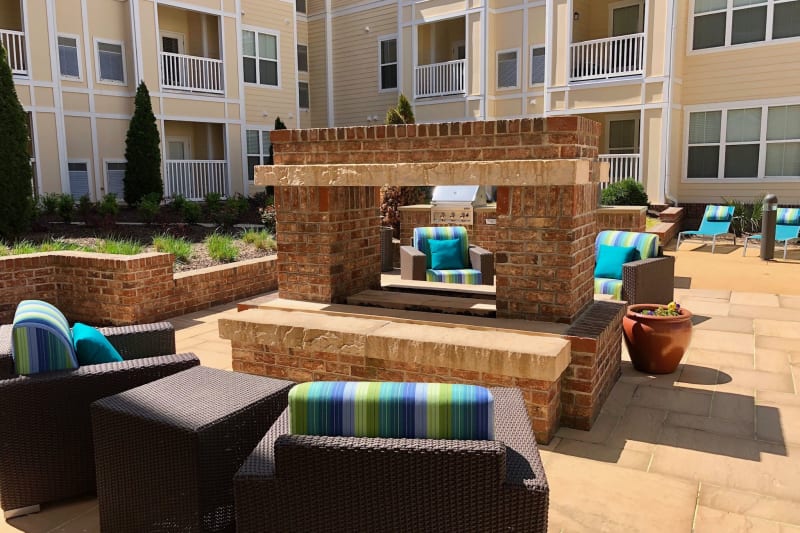 Outdoor lounge chairs by fire at Level at 401 in Raleigh, North Carolina