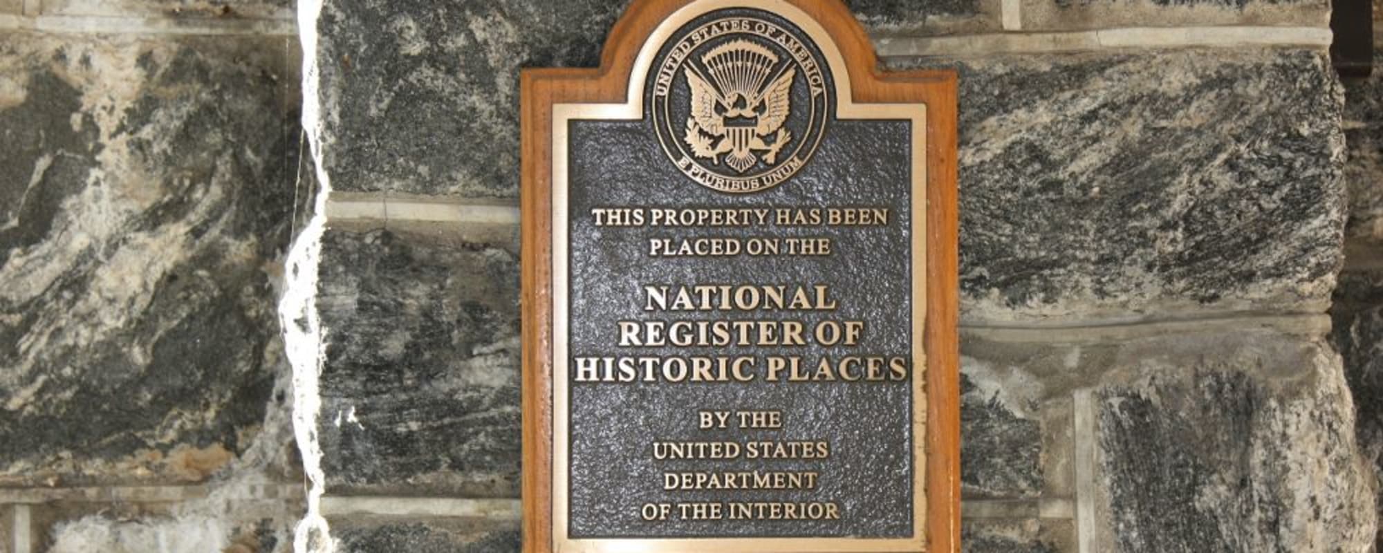 Historical plaque on a wall at Kenilworth Inn in Asheville, North Carolina