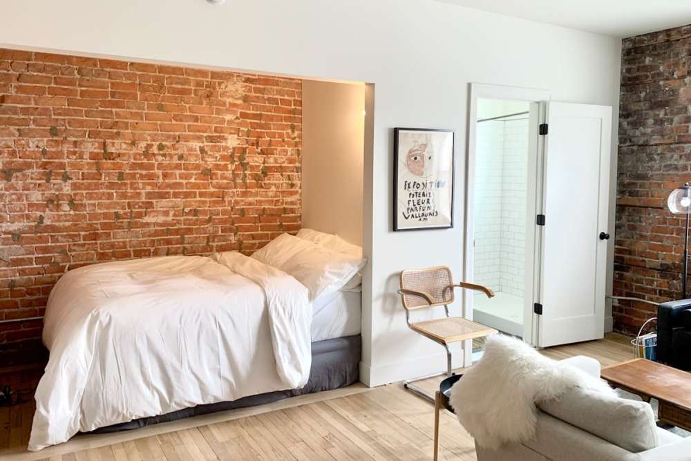 Natural light coming into a bedroom at Detroit Living in Detroit, 