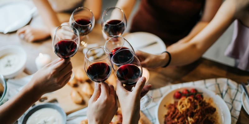 Residents out for dinner and wine near Rolling Park Apartments in Windsor Mill, Maryland