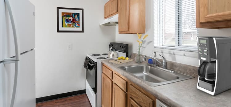 Well-equipped kitchen at Brockport Crossings Apartments & Townhomes home