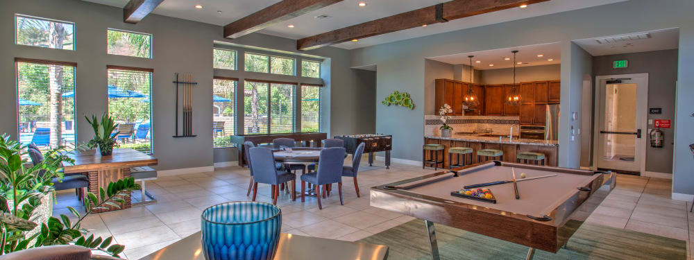 Billiards and plentiful seating in the resident lounge at Palisades Sierra Del Oro in Corona, California