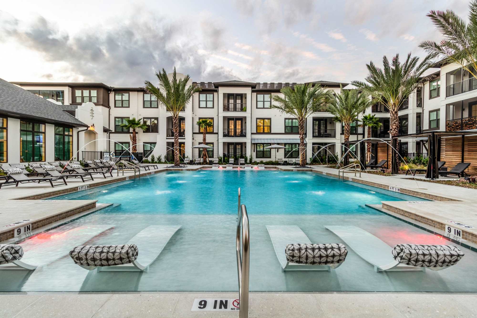 Poolside lounge area with water seating at Brisa at St. Augustine in St. Augustine, Florida