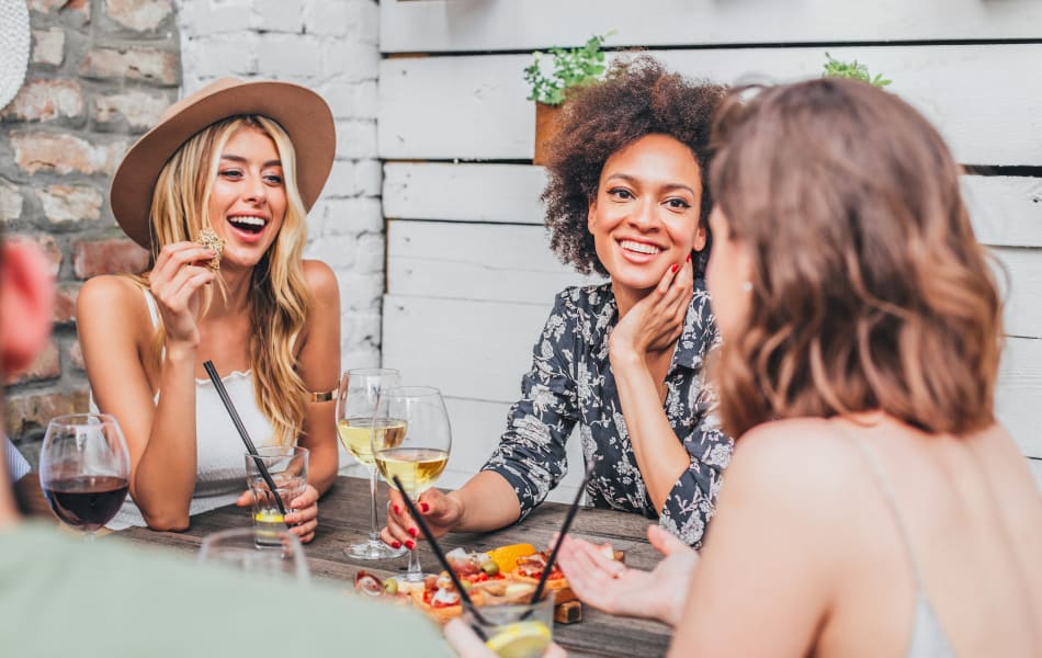 Residents catching up over a glass of wine near Sofi Westview in San Diego, California