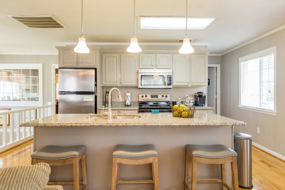 Kitchen with bar stools at Salem Wood Apartments in Salem, Virginia