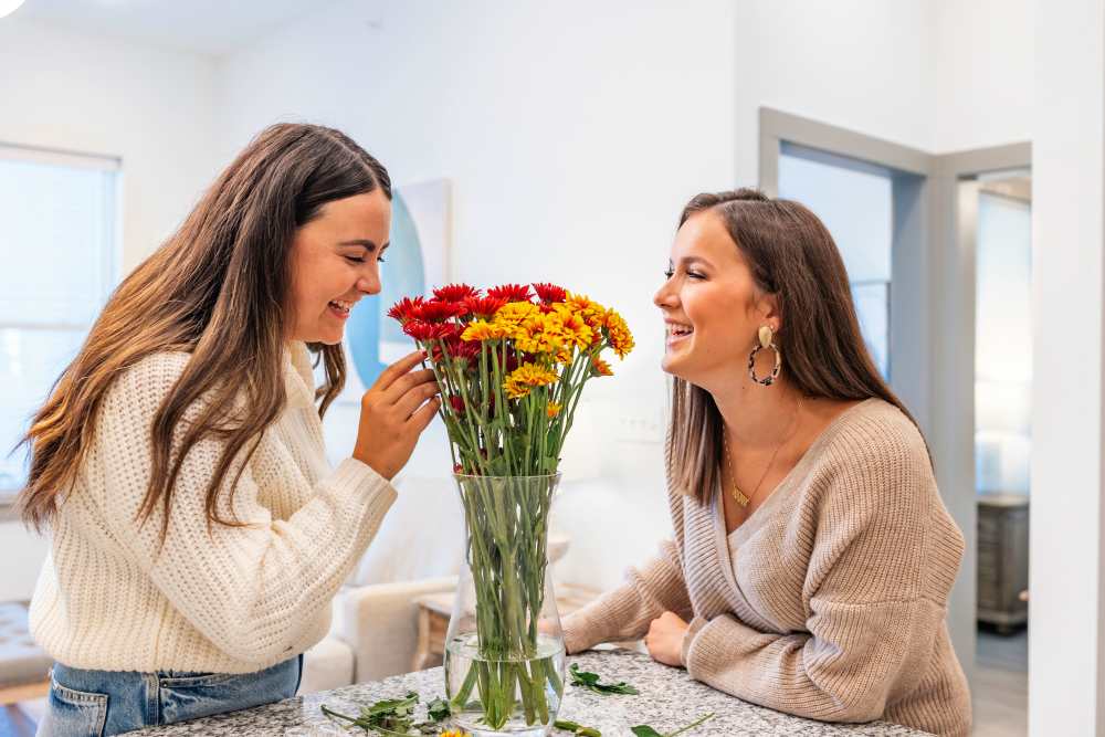Residents in a modern kitchen at The Waters at Promenade in Marrero, Louisiana