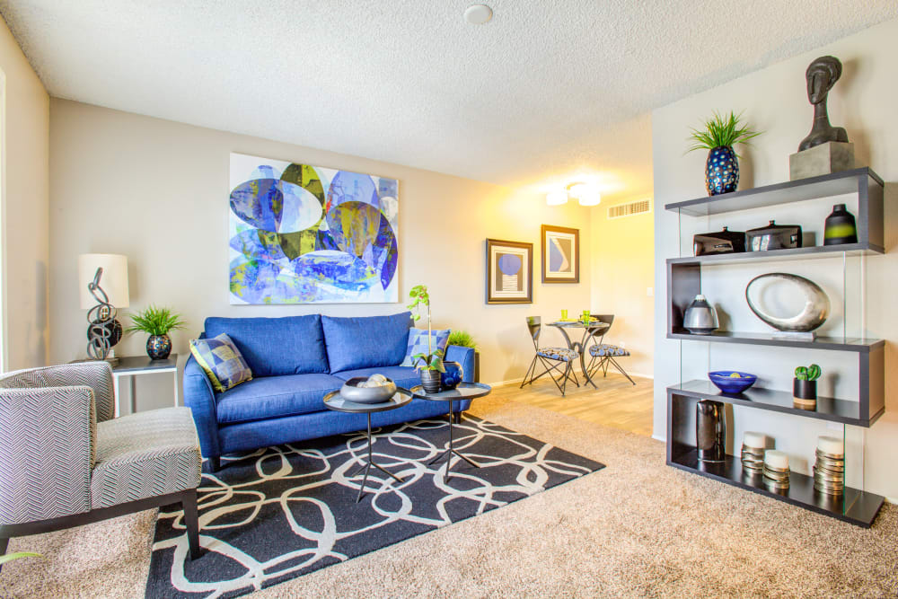 Spacious model living room and dining area at Verde Apartments in Tucson, Arizona