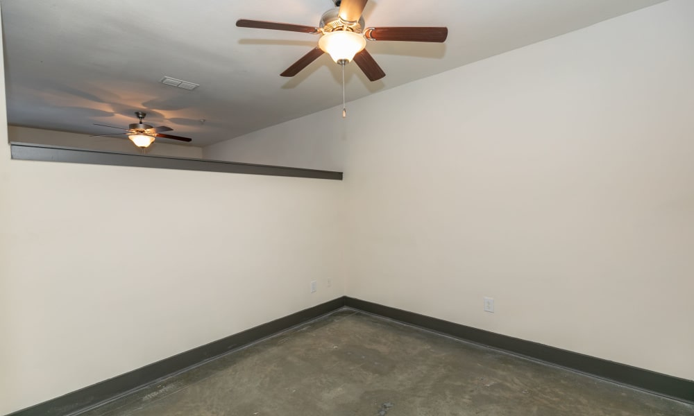 A carpeted living room at Block Lofts in Atlanta, GA