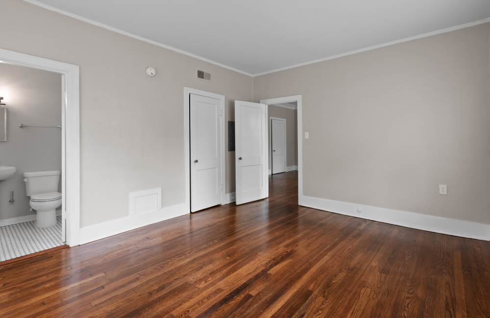 Unfurnished bedroom with access to the attached bathroom at The Avalon in Memphis, Tennessee