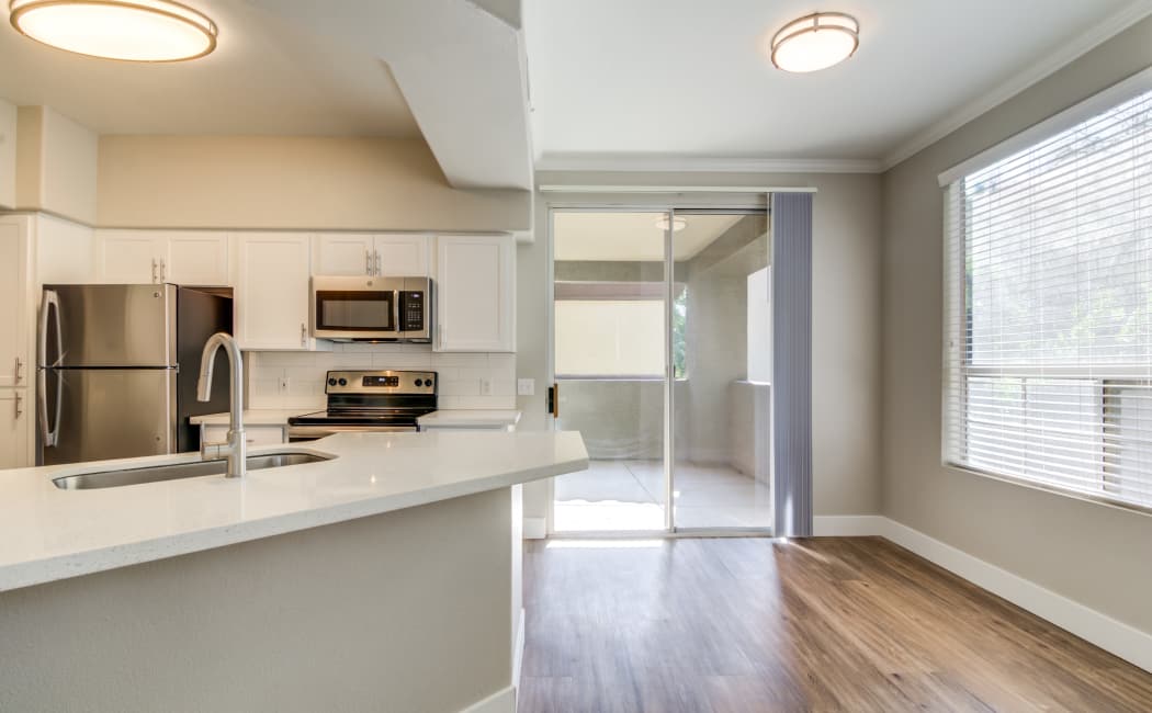 Model home kitchen and living area at Sierra Canyon in Glendale, Arizona