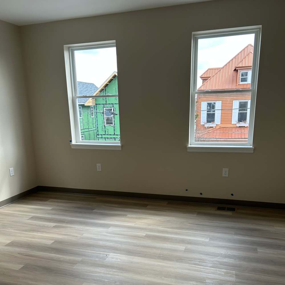 Room with wood floors at Grandview South Homes in Pittsburgh, Pennsylvania