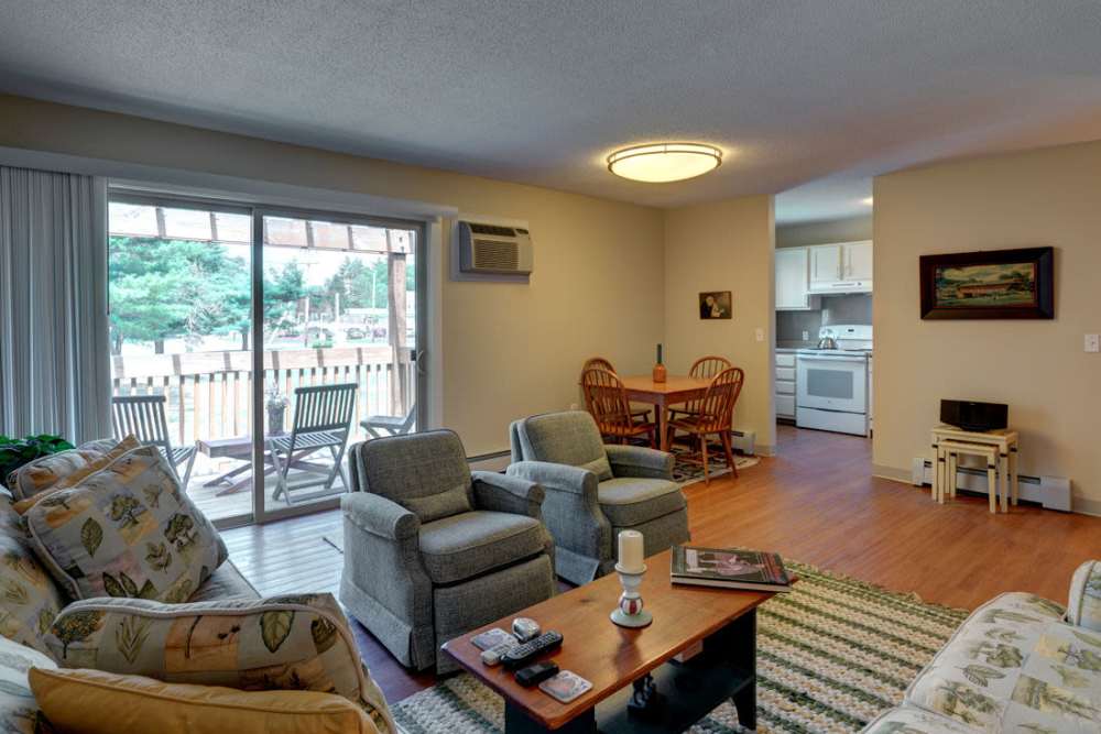 Spacious living and dining area at Middlebury Arms in Middleboro, Massachusetts