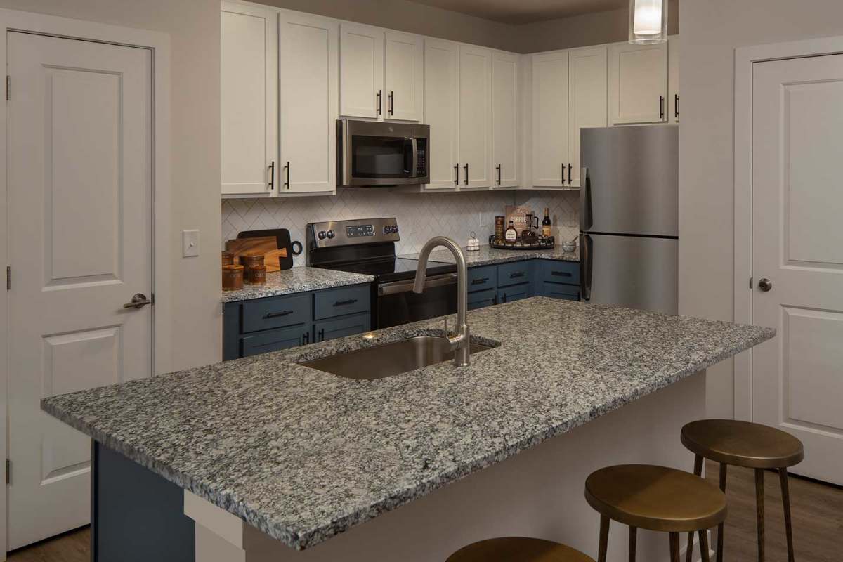 Kitchen in an apartment at Arden at South Point Apartment Homes in McDonough, Georgia