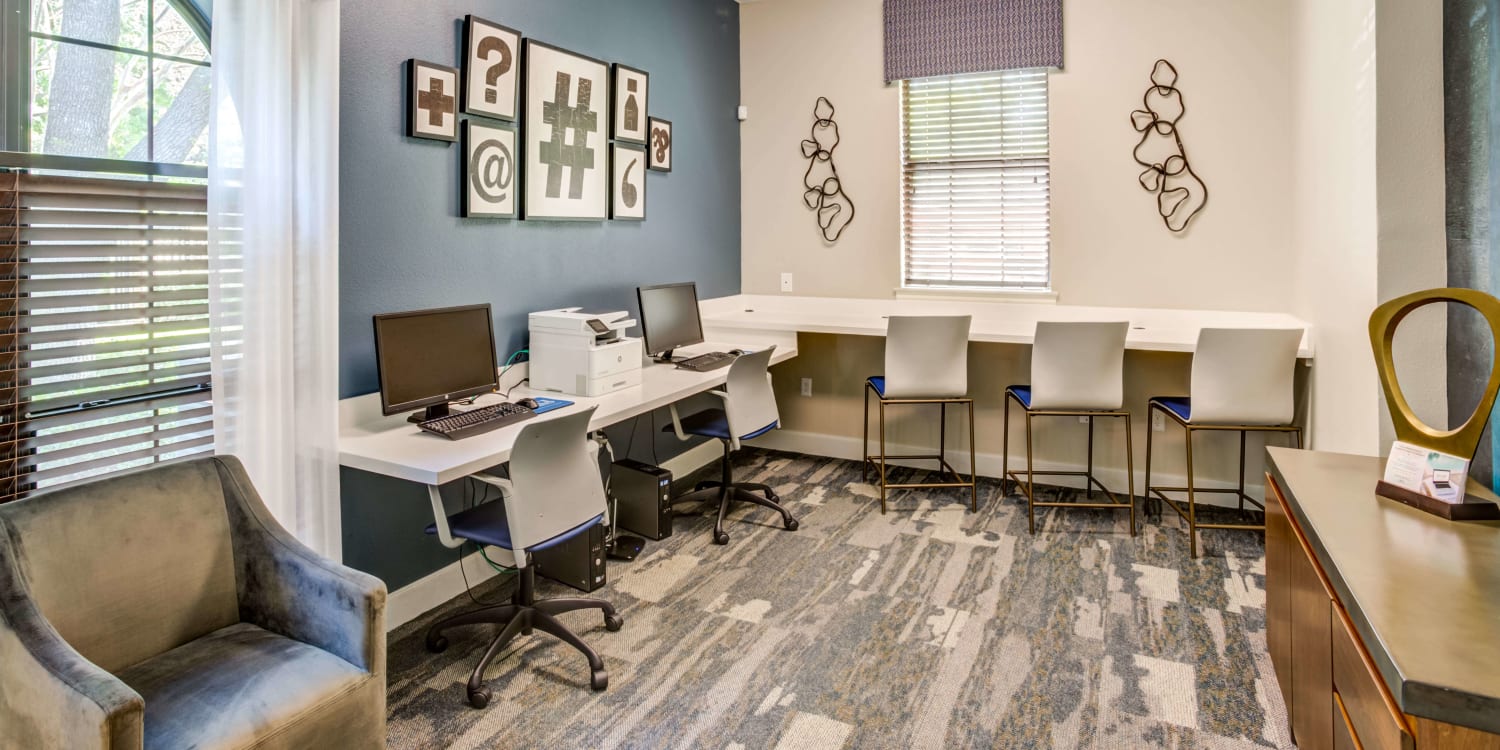 Work stations in the business center at Sola Westchase in Houston, Texas