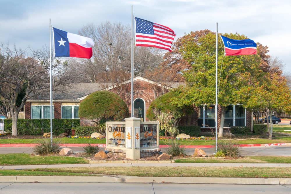 charming apartment community sign at Charter Oaks in Arlington, Texas. Charter Oak in Euless, Texas