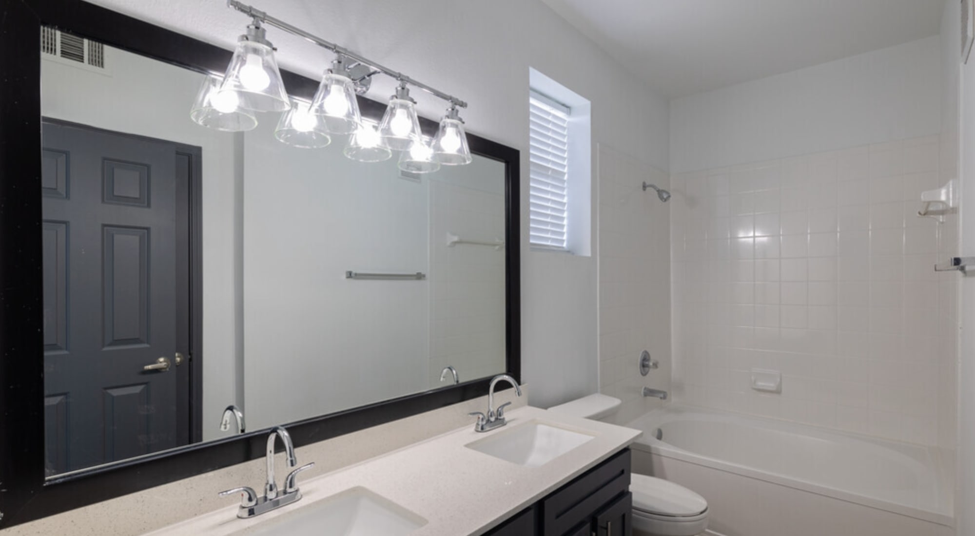 Well-lit bathroom at Legacy at Cypress in Cypress, Texas