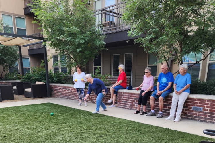 Couple dancing together at Watermere at Frisco in Frisco, Texas