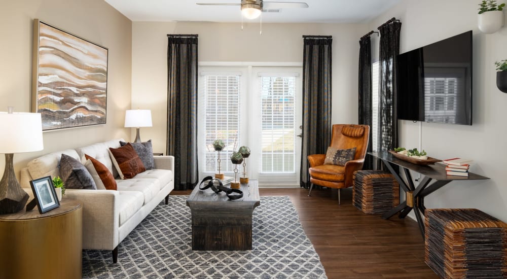 A furnished apartment bedroom at The Alexandria in Madison, Alabama