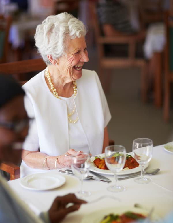 Resident enjoying dinner at The Retreat at Fishersville in Stuarts Draft, Virginia