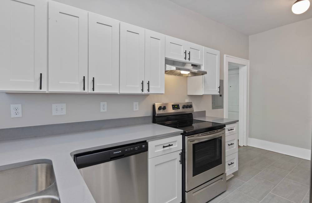 Kitchen dishwasher and range at The Alma in Memphis, Tennessee